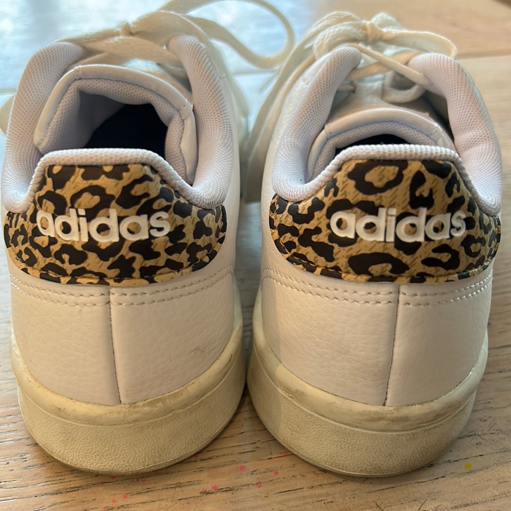 Women’s adidas white shoes with leopard on back